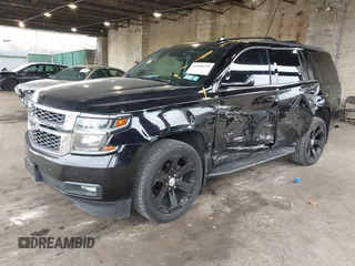 2015 Chevrolet Tahoe LT with VIN 1GNSKBKCXFR604401, listed as a IAAI auction lot 42048559 with 60,768 mi miles and . Bid and sale history available at DreamBid. Image 17.