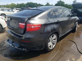 2013 BMW X6 M with VIN 5YMGZ0C50D0C40144, listed as a Copart auction lot 64889554 with 91,024 mi miles and Salvage Title. Bid and sale history available at carsss.com. Image 3.