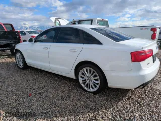 2014 Audi A6 2.0T Premium Plus with VIN WAUGFAFC1EN049090, listed as a Copart auction lot 45419945 with 154,062 mi miles and Salvage Title. Bid and sale history available at carsss.com. Image 2.