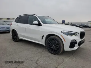 2020 BMW X5 M50i with VIN 5UXJU4C00LL228142, listed as a Copart auction lot 81246294 with 86,014 mi miles and Clean Title. Bid and sale history available at DreamBid. Image 4.