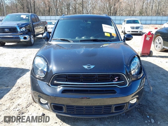2015 MINI Countryman S with VIN WMWZC3C5XFWT04916, listed as a IAAI auction lot 41636369 with 101,448 mi miles and . Bid and sale history available at DreamBid. Image 12.