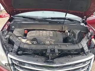 2016 Chevrolet Traverse LT z VIN 1GNKRHKD5GJ213065, wystawiony jako IAAI lot #41488144 z przebiegiem 146 625 mil mil oraz . Historia ofert i sprzedaży dostępna na DreamBid. Obrazek 10.