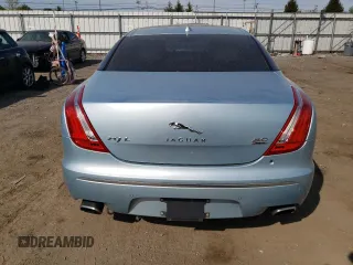 2013 Jaguar XJ Portfolio with VIN SAJWJ2GD3D8V47879, listed as a Copart auction lot 54558195 with 99,500 mi miles and Clean Title. Bid and sale history available at DreamBid. Image 6.