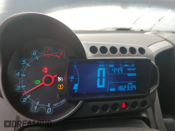 2012 Chevrolet Sonic LT z VIN 1G1JD5SB5C4218560, wystawiony jako Copart lot #75256184 z przebiegiem 182 339 mil mil oraz Szkoda całkowita • Salvage title. Historia ofert i sprzedaży dostępna na DreamBid. Obrazek 9.