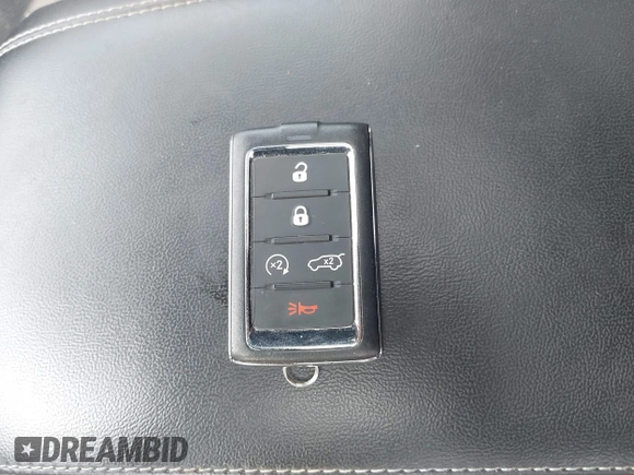 2023 Jeep Grand Cherokee Laredo with VIN 1C4RJHAG2PC660094, listed as a IAAI auction lot 42390290 with 27,802 mi miles and . Bid and sale history available at DreamBid. Image 11.