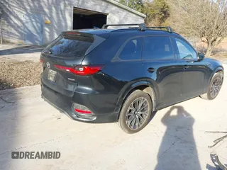 2025 Mazda CX-70 S Premium with VIN JM3KJDHC8S1109547, listed as a IAAI auction lot 41520148 with 11,684 mi miles and . Bid and sale history available at DreamBid. Image 4.