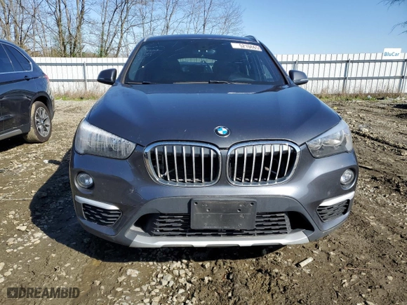 2018 BMW X1 xDrive28i with VIN WBXHT3C30J5K27472, listed as a Copart auction lot 52106655 with 120,936 mi miles and Clean Title. Bid and sale history available at carsss.com. Image 5.