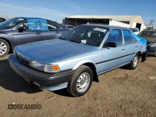 1990 Toyota Camry z VIN 4T1SV24E0LU137556, wystawiony jako Copart lot #84628404 z przebiegiem 247 203 mil mil oraz Czysty tytuł • Clean title. Historia ofert i sprzedaży dostępna na DreamBid. Obrazek 1.