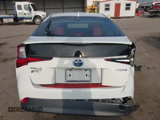 2019 Toyota Prius L Eco z VIN JTDKARFU8K3069783, wystawiony jako IAAI lot #42041554 z przebiegiem 107 363 mil mil oraz . Historia ofert i sprzedaży dostępna na DreamBid. Obrazek 16.