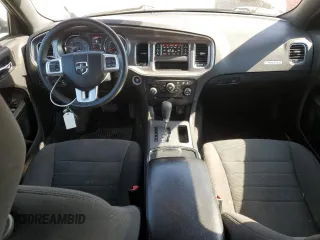 2013 Dodge Charger SE z VIN 2C3CDXBG6DH543556, wystawiony jako Copart lot #50072135 z przebiegiem 246 957 mil mil oraz Tytuł czysty. Historia ofert i sprzedaży dostępna na DreamBid. Obrazek 8.