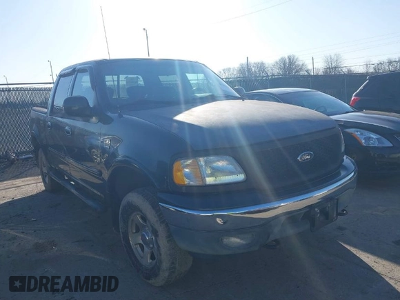 2002 Ford F-150 XLT with VIN 1FTRW08L12KB71710, listed as a IAAI auction lot 41826511 with 1 mi miles. Bid and sale history available at carsss.com. Image 1.