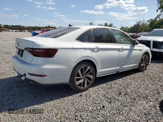 2021 Volkswagen Jetta GLI S z VIN 3VW6T7BU7MM021776, wystawiony jako Copart lot #55020415 z przebiegiem 61 456 mil mil oraz Nie do naprawy. Historia ofert i sprzedaży dostępna na DreamBid. Obrazek 3.