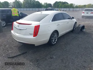 2013 Cadillac XTS with VIN 2G61N5S39D9145885, listed as a IAAI auction lot 42044388 with 181,645 mi miles and . Bid and sale history available at DreamBid. Image 4.