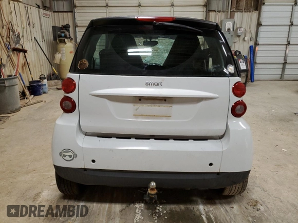 2010 Smart fortwo Pure z VIN WMEEJ3BA7AK418332, wystawiony jako Copart lot #54827925 z przebiegiem 39 972 mil mil oraz Szkoda całkowita • Salvage title. Historia ofert i sprzedaży dostępna na DreamBid. Obrazek 6.