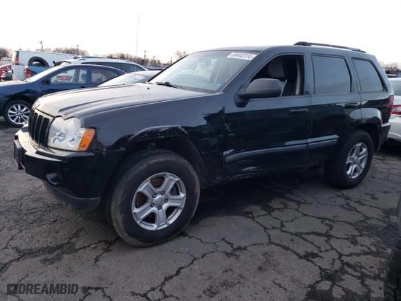 2007 Jeep Grand Cherokee Laredo with VIN 1J8GR48K17C543067, listed as a Copart auction lot 84442224 with 125,446 mi miles and Salvage Title. Bid and sale history available at carsss.com. Image 1.
