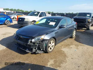 2015 Kia Optima LX with VIN KNAGM4A71F5568868, listed as a IAAI auction lot 42431920 with 138,217 mi miles and . Bid and sale history available at DreamBid. Image 2.