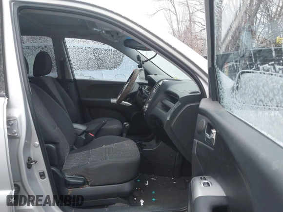 2005 Kia Sportage LX with VIN KNDJE723257071317, listed as a IAAI auction lot 41547643 with 267,610 mi miles and . Bid and sale history available at carsss.com. Image 5.