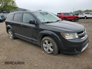 2012 Dodge Journey SXT with VIN 3C4PDDBG5CT226207, listed as a Copart auction lot 57668305 with 201,404 mi miles and Clean title. Bid and sale history available at DreamBid. Image 4.