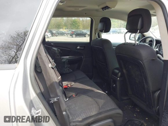 2015 Dodge Journey SXT with VIN 3C4PDDBG4FT554643, listed as a IAAI auction lot 42172378 with 144,924 mi miles and . Bid and sale history available at DreamBid. Image 8.