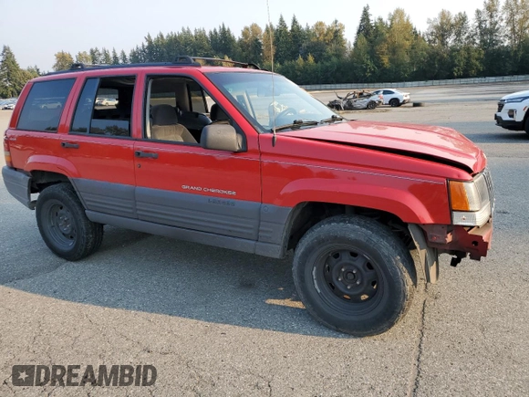 1996 Jeep Grand Cherokee z VIN 1J4EZ58Y5TC142263, wystawiony jako Copart lot #70532894 z przebiegiem Nie podano mil oraz Szkoda całkowita • Salvage title. Historia ofert i sprzedaży dostępna na DreamBid. Obrazek 4.