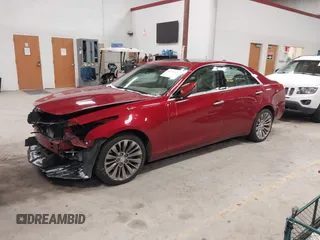 2016 Cadillac CTS Luxury Collection AWD z VIN 1G6AX5SX6G0124584, wystawiony jako IAAI lot #41235515 z przebiegiem 82 286 mil mil oraz . Historia ofert i sprzedaży dostępna na DreamBid. Obrazek 2.