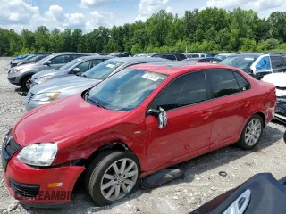2010 Volkswagen Jetta Wolfsburg Edition with VIN 3VWRJ7AJXAM154666, listed as a Copart auction lot 60556875 with 149,509 mi miles and Salvage title. Bid and sale history available at DreamBid. Image 1.