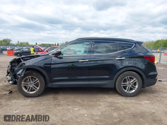 2018 Hyundai Santa Fe 2.4L z VIN 5NMZUDLB2JH058032, wystawiony jako IAAI lot #42206116 z przebiegiem 138 688 mil mil oraz . Historia ofert i sprzedaży dostępna na DreamBid. Obrazek 15.