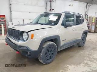 2017 Jeep Renegade Trailhawk z VIN ZACCJBCB6HPE97998, wystawiony jako IAAI lot #42435849 z przebiegiem 105 490 mil mil oraz . Historia ofert i sprzedaży dostępna na DreamBid. Obrazek 16.