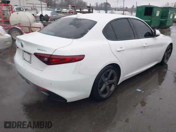 2017 Alfa Romeo Giulia with VIN ZARFAEBN5H7540188, listed as a IAAI auction lot 41619098 with 106,512 mi miles. Bid and sale history available at carsss.com. Image 4.