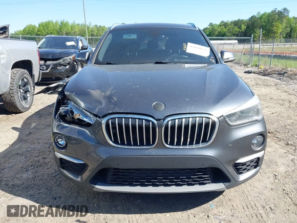 2017 BMW X1 xDrive28i with VIN WBXHT3C31H5F80056, listed as a IAAI auction lot 42049925 with 64,471 mi miles and . Bid and sale history available at DreamBid. Image 12.