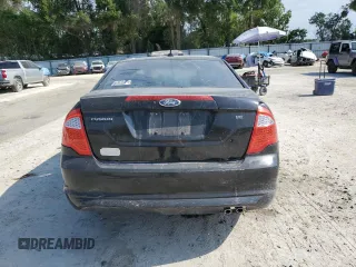2012 Ford Fusion SE with VIN 3FAHP0HA3CR167698, listed as a Copart auction lot 55909695 with 128,025 mi miles and Salvage title. Bid and sale history available at DreamBid. Image 6.