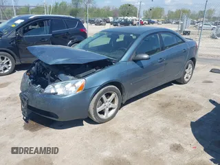 2006 Pontiac G6 6-Cyl with VIN 1G2ZG558264278824, listed as a IAAI auction lot 42255250 with 117,111 mi miles and . Bid and sale history available at DreamBid. Image 17.
