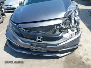 2020 Honda Civic LX with VIN 2HGFC2F67LH551651, listed as a IAAI auction lot 41861966 with 205,619 mi miles and . Bid and sale history available at DreamBid. Image 12.