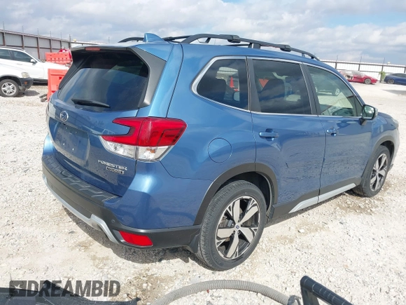 2020 Subaru Forester Touring with VIN JF2SKAXCXLH433924, listed as a IAAI auction lot 40693779 with 36,870 mi miles. Bid and sale history available at carsss.com. Image 4.