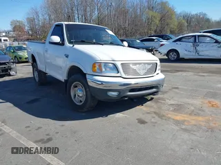 2000 Ford F-150 XL with VIN 1FTRF18W2YNB42014, listed as a IAAI auction lot 41827247 with Not provided miles and . Bid and sale history available at DreamBid. Image 1.