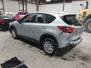 2016 Mazda CX-5 Sport with VIN JM3KE2BY2G0718434, listed as a IAAI auction lot 41961364 with 145,748 mi miles. Bid and sale history available at carsss.com. Image 3.