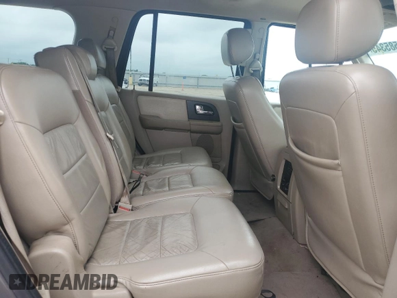 2005 Ford Expedition Limited с VIN 1FMFU19575LA09329, выставлен на аукционе Copart как лот 54585345 с пробегом 264 703 миль миль и Списание • Salvage title. История ставок и продаж доступна на DreamBid. Изображение 11.