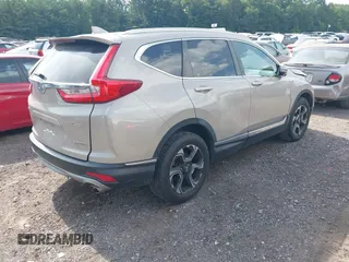 2018 Honda CR-V Touring with VIN 5J6RW2H96JL000910, listed as a IAAI auction lot 42490580 with 201,534 mi miles and . Bid and sale history available at DreamBid. Image 4.