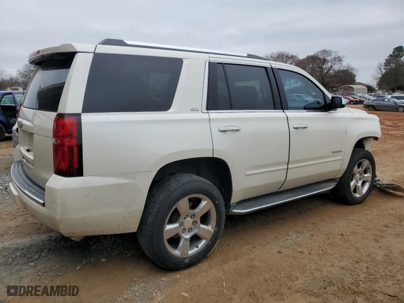 2015 Chevrolet Tahoe LTZ with VIN 1GNSCCKC3FR672168, listed as a Copart auction lot 85527284 with 160,822 mi miles and Salvage Title. Bid and sale history available at carsss.com. Image 3.