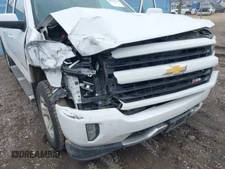 2018 Chevrolet Silverado 1500 LT with VIN 3GCUKREC0JG594914, listed as a IAAI auction lot 41735134 with 98,407 mi miles. Bid and sale history available at carsss.com. Image 6.