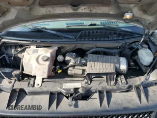 2004 Chevrolet Express Passenger with VIN 1GAHG39U741128458, listed as a Copart auction lot 64436215 with 118,387 mi miles and Salvage title. Bid and sale history available at DreamBid. Image 12.