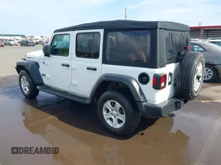 2023 Jeep Wrangler Willys with VIN 1C4HJXDG5PW566145, listed as a IAAI auction lot 41912872 with 50,290 mi miles and . Bid and sale history available at DreamBid. Image 3.