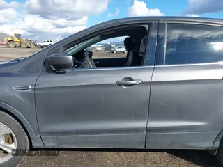 2013 Ford Escape SE with VIN 1FMCU9GX8DUC76686, listed as a IAAI auction lot 41809554 with 126,718 mi miles. Bid and sale history available at carsss.com. Image 14.
