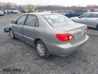 2004 Toyota Corolla CE with VIN 2T1BR32E24C309957, listed as a IAAI auction lot 41894304 with 299,999 mi miles. Bid and sale history available at carsss.com. Image 3.