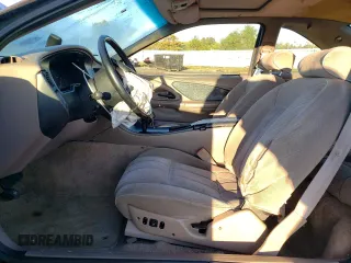 1995 Ford Thunderbird LX z VIN 1FALP6248SH176946, wystawiony jako Copart lot #74066554 z przebiegiem 72 666 mil mil oraz Szkoda całkowita • Salvage title. Historia ofert i sprzedaży dostępna na DreamBid. Obrazek 7.