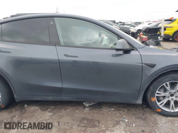 2023 Tesla Model Y Long Range with VIN 7SAYGAEE8PF587202, listed as a IAAI auction lot 41306811 with 1 mi miles. Bid and sale history available at carsss.com. Image 12.