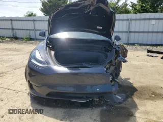 2024 Tesla Model Y with VIN 7SAYGDED6RF091715, listed as a Copart auction lot 56535585 with 23,120 mi miles and Salvage title. Bid and sale history available at DreamBid. Image 5.