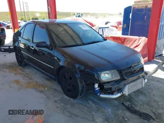 2001 Volkswagen Jetta z VIN 3VWTG29M51M074360, wystawiony jako IAAI lot #41785538 z przebiegiem 120 034 mil mil oraz . Historia ofert i sprzedaży dostępna na DreamBid. Obrazek 1.