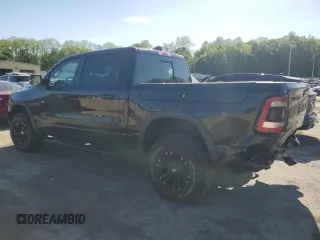 2019 Ram 1500 Rebel z VIN 1C6SRFLT5KN811457, wystawiony jako Copart lot #57034285 z przebiegiem 84 077 mil mil oraz Szkoda całkowita • Salvage title. Historia ofert i sprzedaży dostępna na DreamBid. Obrazek 2.