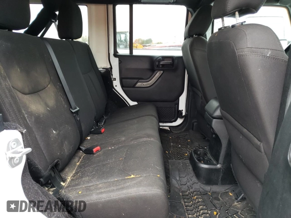 2018 Jeep Wrangler JK Unlimited Sport S with VIN 1C4BJWDG9JL825714, listed as a Copart auction lot 73287794 with 103,643 mi miles and Salvage Title. Bid and sale history available at carsss.com. Image 11.